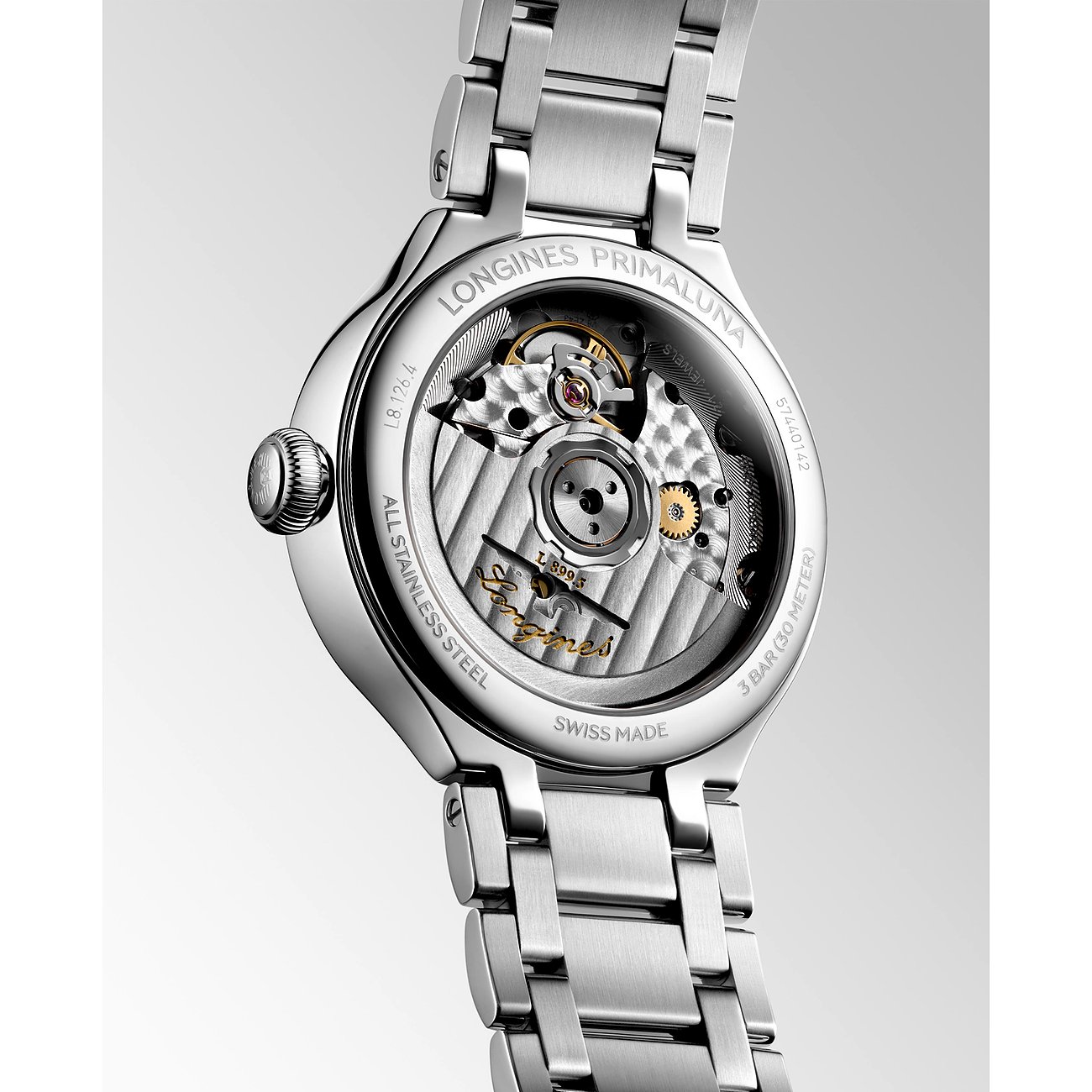 Rückseite einer Longines PRIMALUNA Damenuhr aus Edelstahl mit sichtbarem Uhrwerk und Prägungen.
