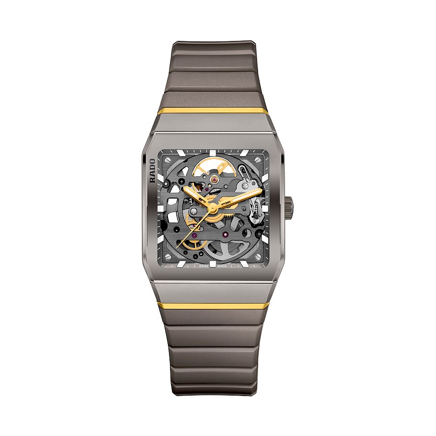 Rado Herrenuhr aus Keramik von oben, mit goldfarbenen Akzenten und einem offenen Zifferblatt, das das Uhrwerk zeigt.