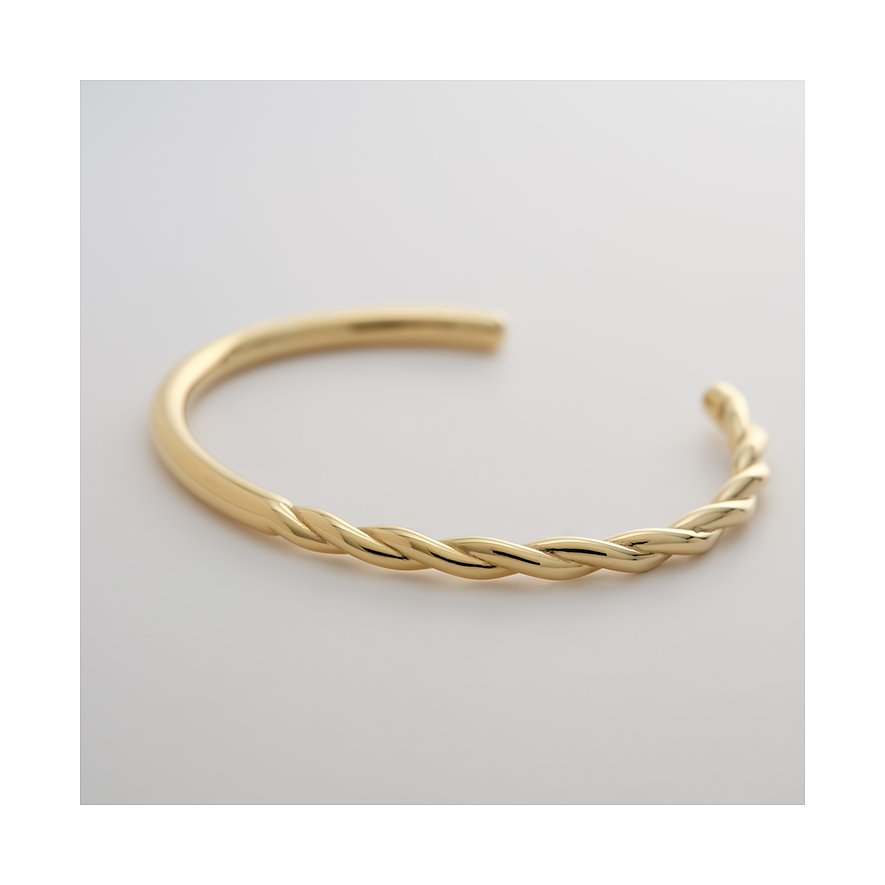 Bracelet Guido Maria Kretschmer en acier inoxydable doré. Une moitié du bracelet est lisse, l'autre moitié est torsadée.