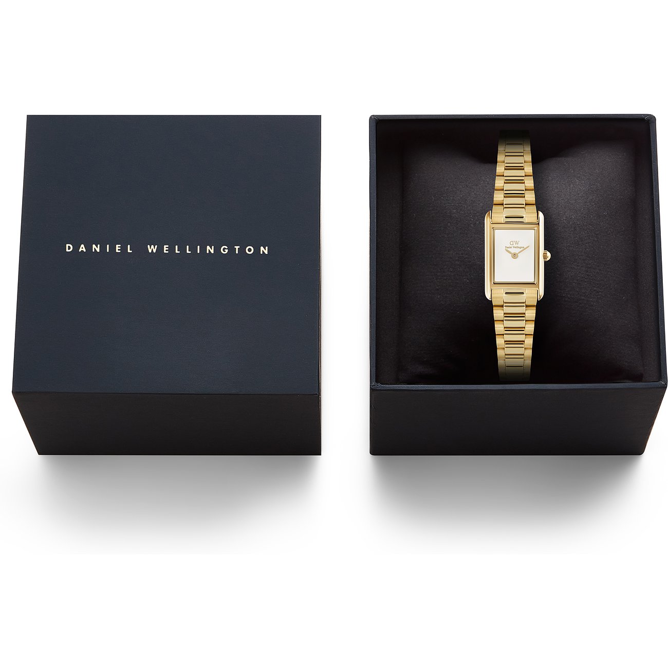 Die goldene Daniel Wellington Damenuhr aus Edelstahl liegt in einer geöffneten schwarzen Geschenkbox.