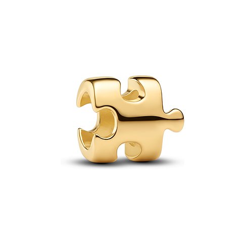 Ein goldenes Pandora-Metall-Charm in Form eines Puzzleteils mit glänzender Oberfläche.