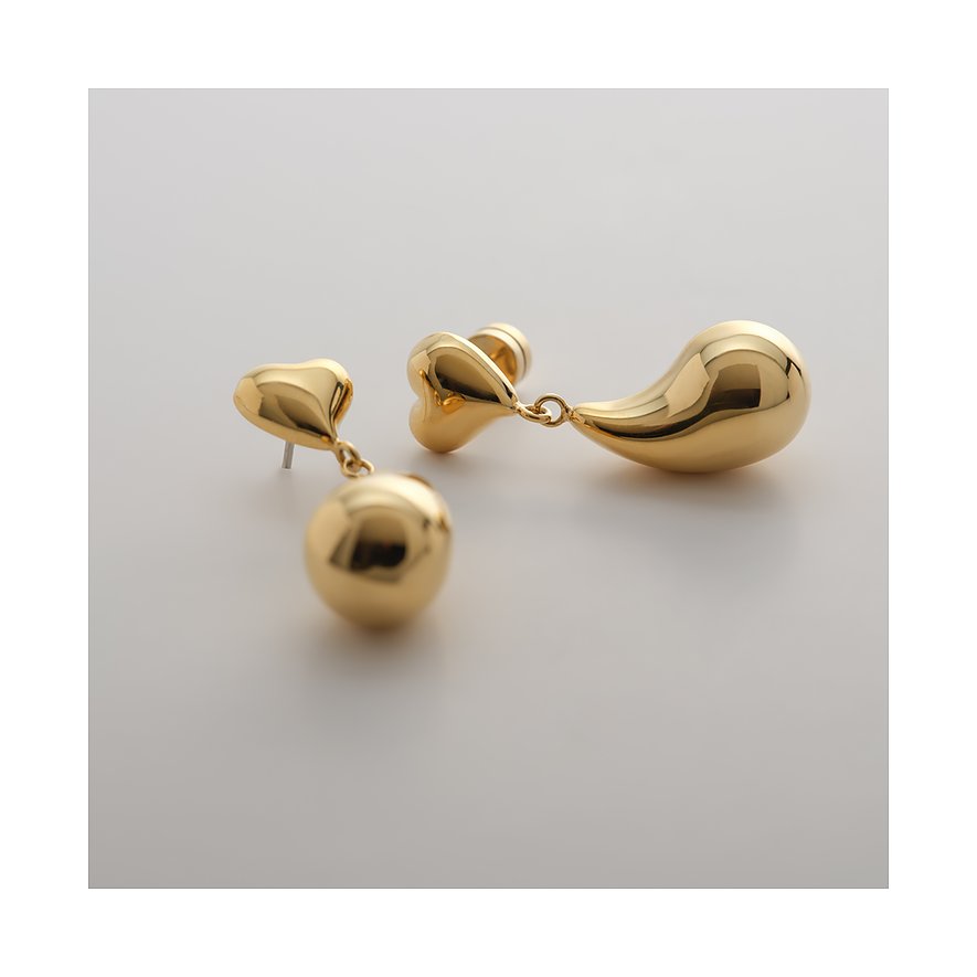 Boucles d'oreilles Guido Maria Kretschmer en acier inoxydable jaune brillant, en forme de cœur et de goutte.