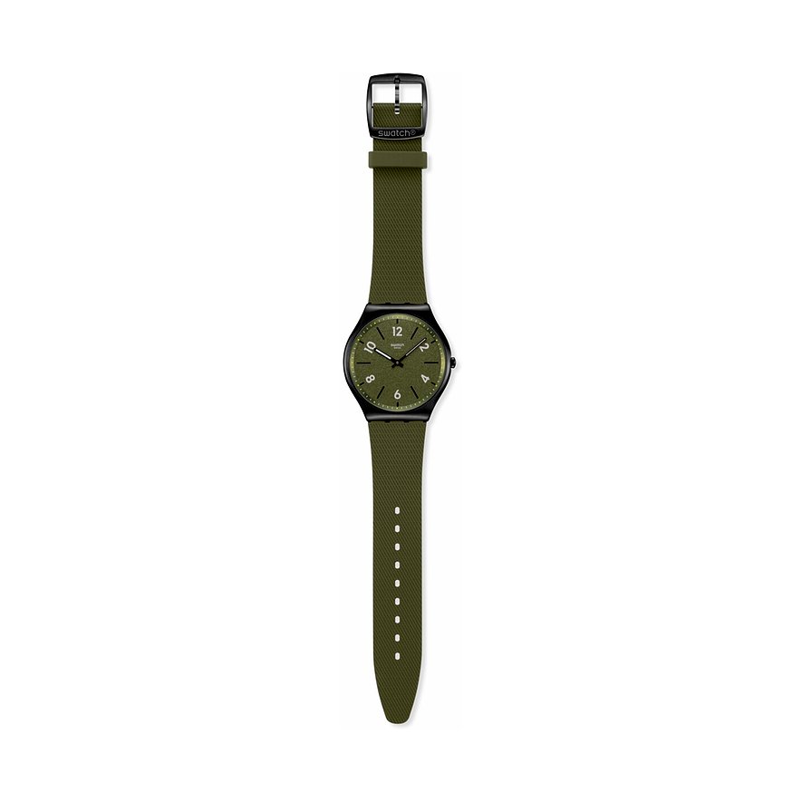 Orologio unisex Swatch con cassa in acciaio inossidabile nero e cinturino in tessuto verde su superficie bianca.