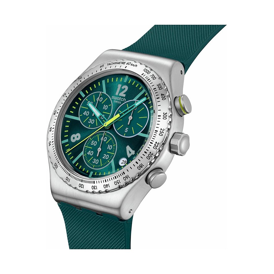 Swatch Unisexuhr aus Edelstahl mit türkisgrünem Zifferblatt und passendem Silikonarmband, von oben rechts betrachtet.