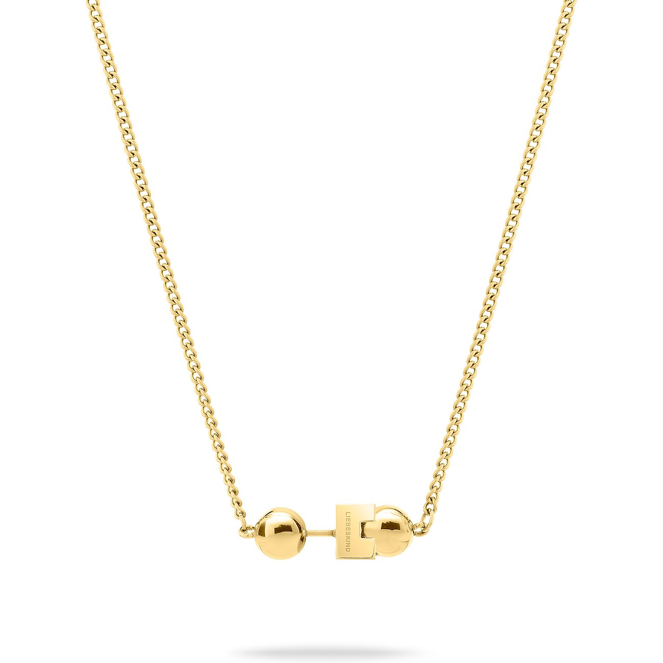 Närbild av ett gyllene Liebeskind-halsband i rostfritt stål med två runda guldkulor och ett rektangulärt element i mitten.