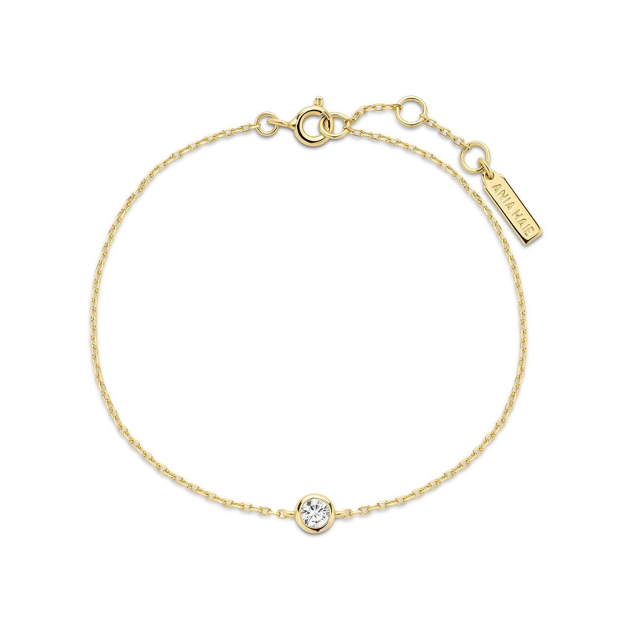 Bracelet Ania Haie en argent sterling 925 plaqué or, orné d'une zircone ronde centrale.