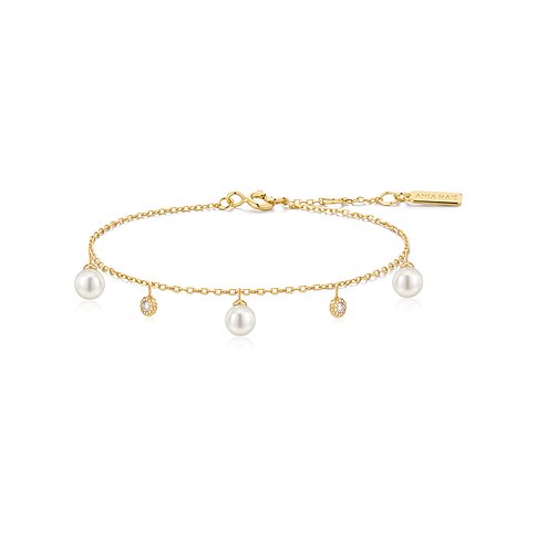 Ania Haie feines Armkettchen aus vergoldetem Silber mit mehreren Perlen und Zirkonia als Anhänger.