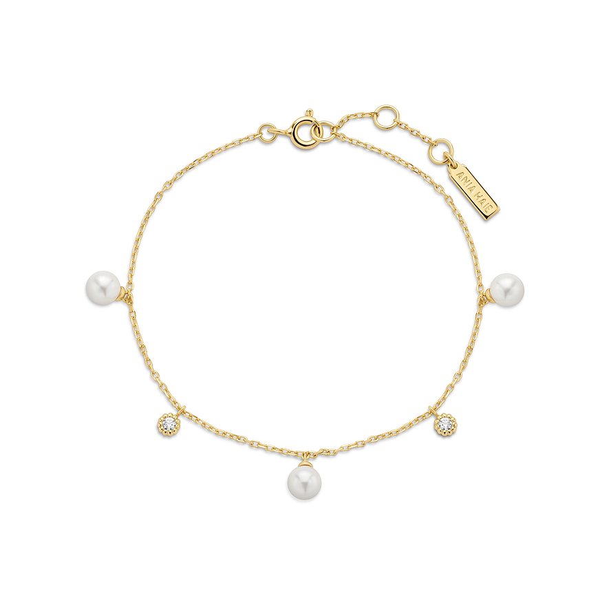 Ania Haie Armband aus vergoldetem Silber mit fünf Perlenanhängern und zwei Zirkonia-Verzierungen.