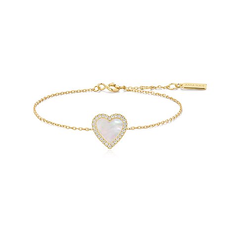 Bracelet Ania Haie en argent plaqué or avec un insert de nacre en forme de cœur, entouré de zircones.