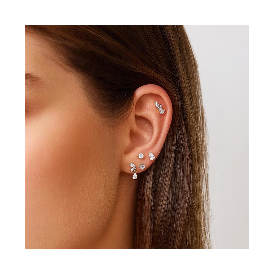 Ania Haie Ohrschmuck Set aus vergoldetem Silber mit Zirkonia, das an einem Ohr getragen wird und elegant aussieht.