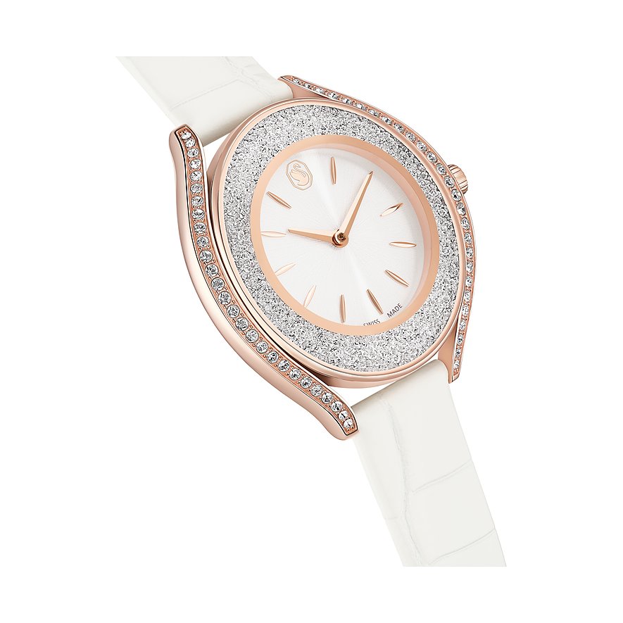 Swarovski Unisexuhr: roségoldfarbener Edelstahl, weißes Zifferblatt, weißes Band, umrandet von funkelnden Kristallen.