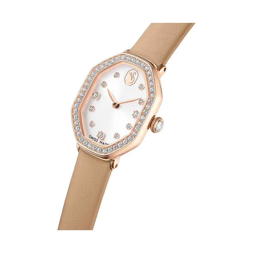 Nahaufnahme einer Swarovski Quarzuhr aus Edelstahl mit einem achteckigen Gehäuse und beigen Lederarmband.