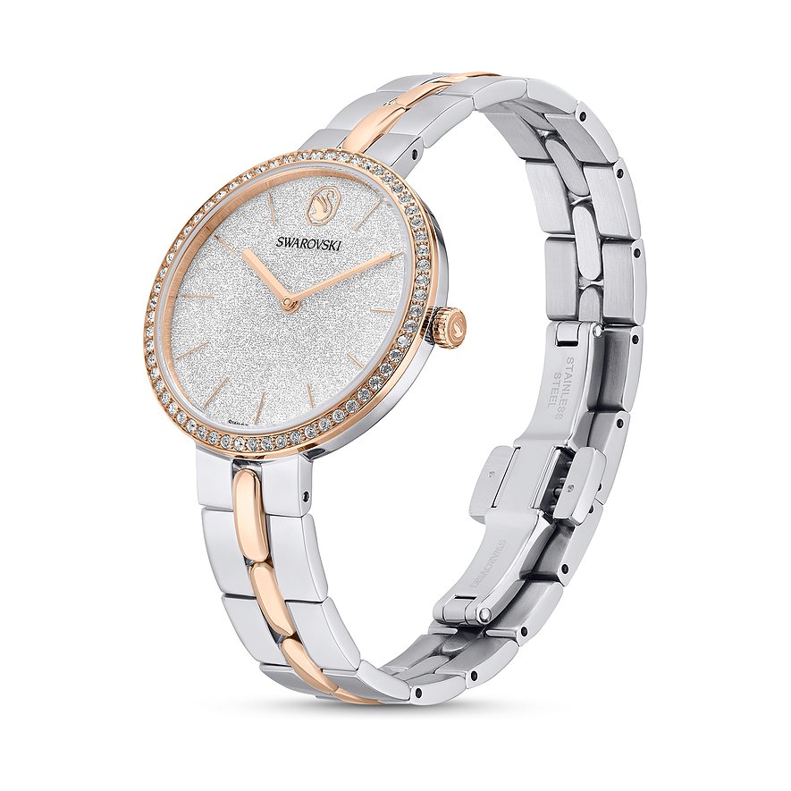 Swarovski Damenuhr: Edelstahl, zweifarbiges Gliederarmband, glitzerndes Kristall-Zifferblatt, roségoldene Lünette mit Farbsteinen.