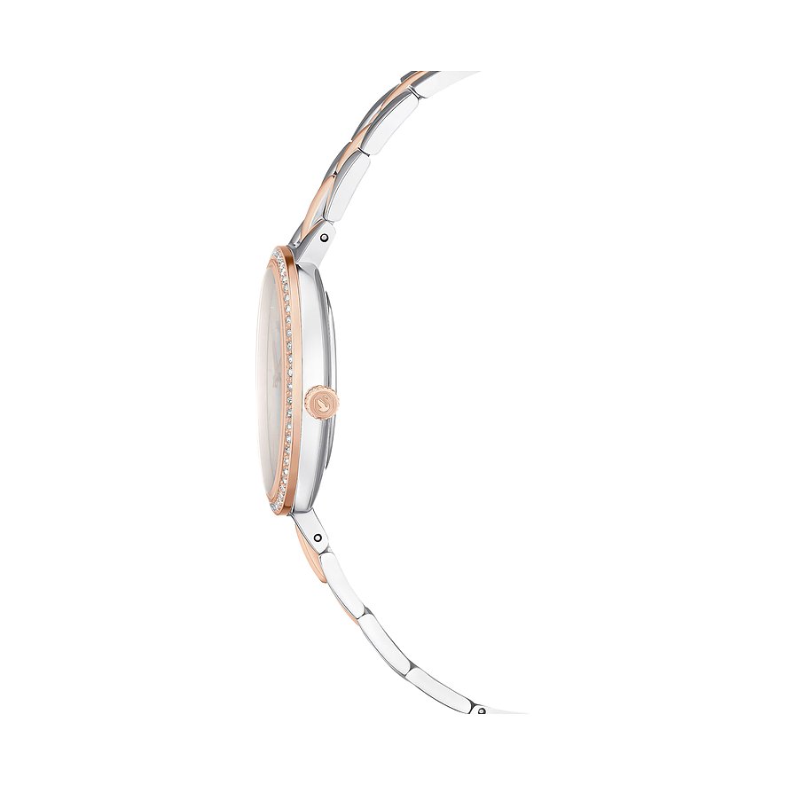 Seitenansicht einer Swarovski Damenuhr aus Edelstahl mit roségoldfarbenem Gehäuse und Swarovski-Kristallen.