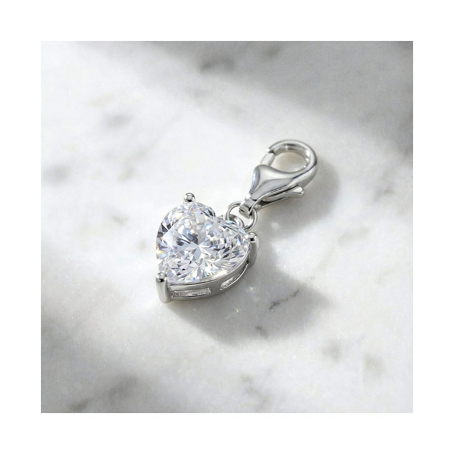 Engelsrufer Anhänger aus Silber mit Herz aus Zirkonia-Farbstein. Eine Seitenansicht des hängenden Charms.