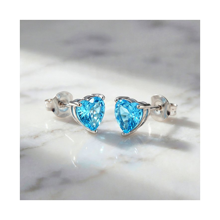 Engelsrufer Ohrstecker aus 925er Silber mit herzförmigen, hellblauen Zirkonia Farbsteinen.