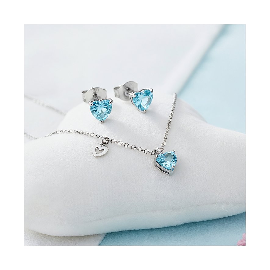 Engelsrufer oorknopjes en halsketting van roestvrij staal met hartvormige lichtblauwe zirkonia kleursteen.