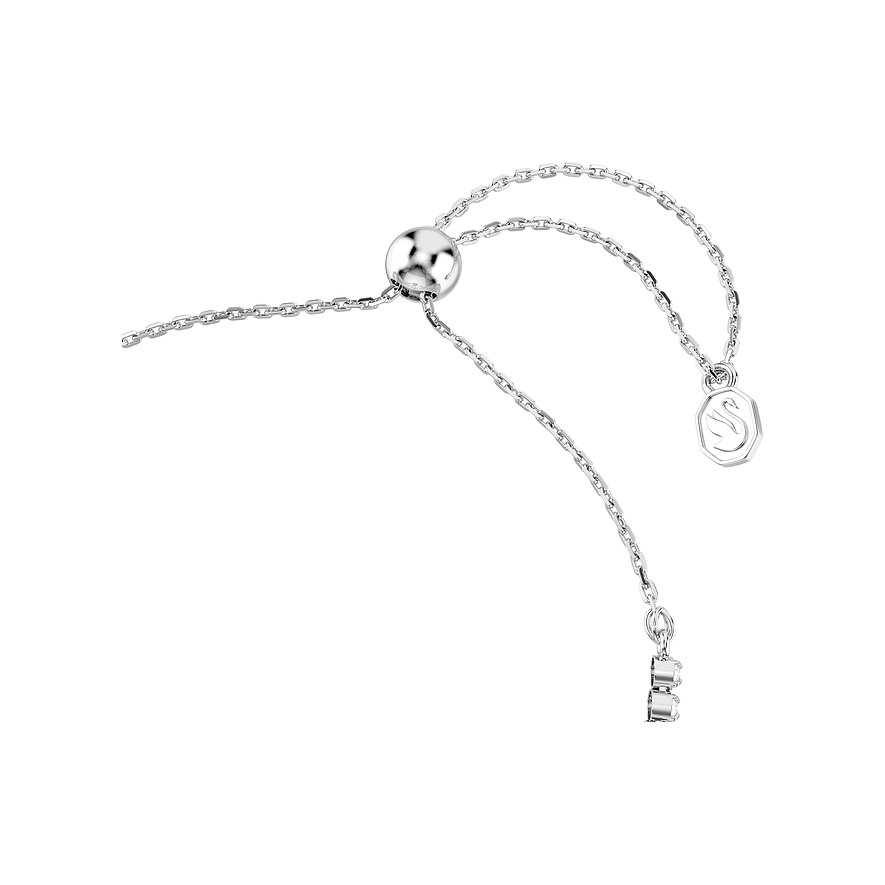 Nahaufnahme des Verschlusses eines Swarovski Armbandes aus Metall mit einem Schiebeverschluss und Logo-Anhänger.