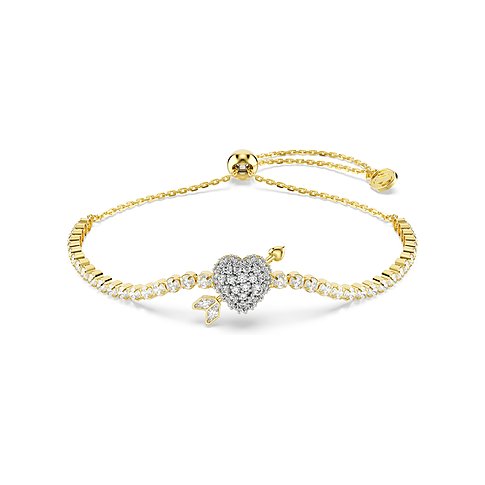 Swarovski Armschmuck aus gelb-goldenem Metall mit einem Herzanhänger, verziert mit weißen Swarovski-Kristallen.