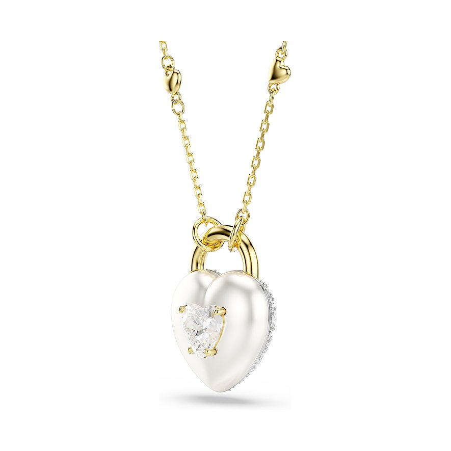 Swarovski Halskette aus goldfarbenem Metall mit herzförmigem Anhänger, verziert mit einem klaren Kristall.