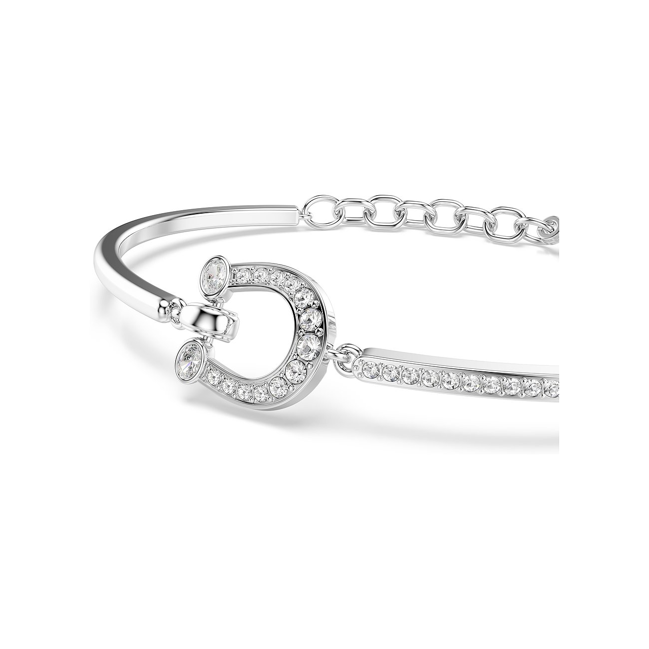 Nahaufnahme eines silberfarbigen Swarovski Armschmucks aus Metall, verziert mit funkelnden klaren Swarovski-Kristallen.