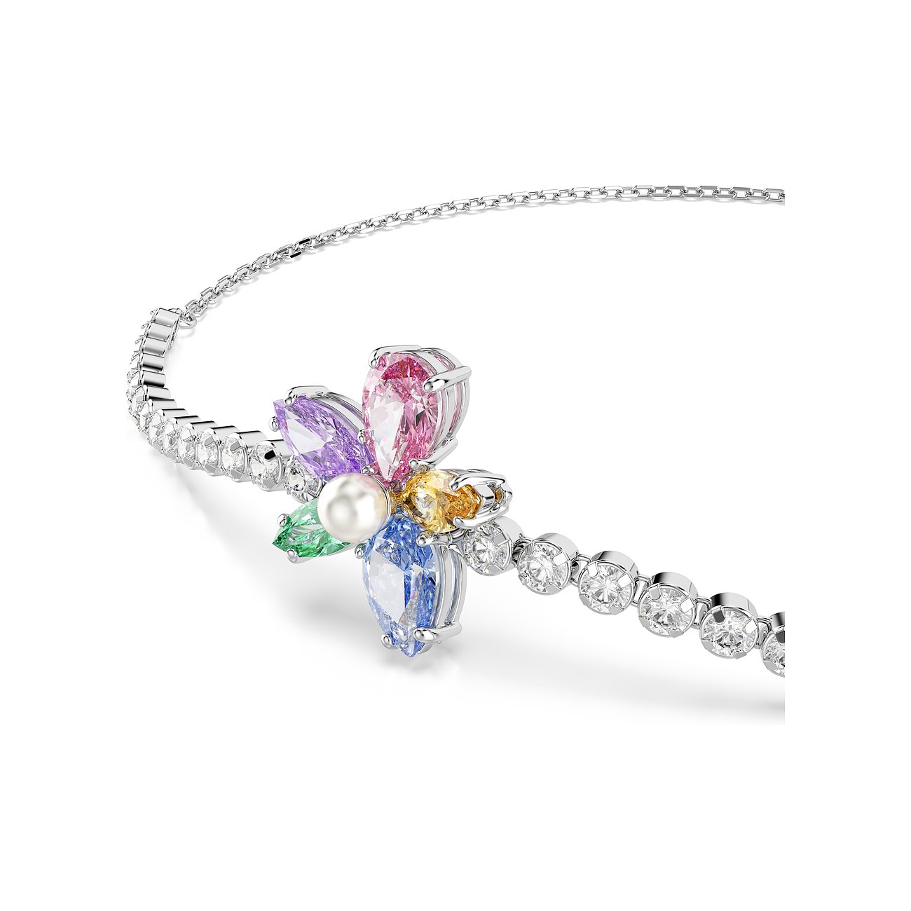 Nahaufnahme eines Swarovski Armschmucks aus Metall mit bunten Farbsteinen und einer Perle in Blumenform.