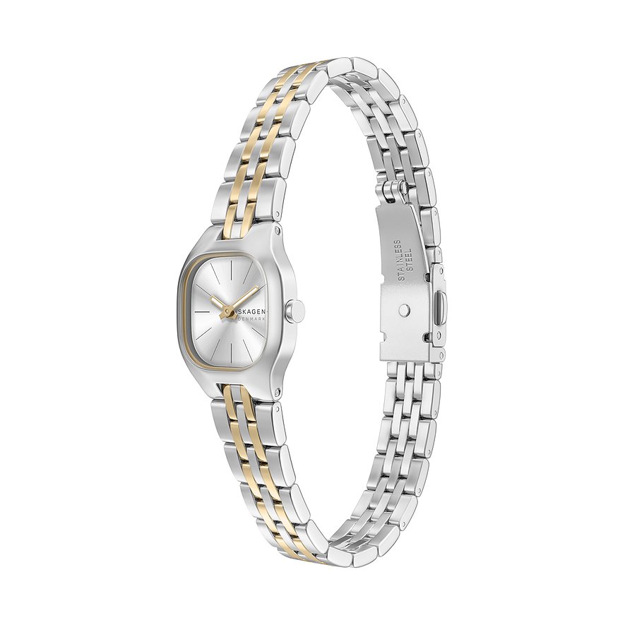 Skagen damklocka i rostfritt stål med ovalt boett och tvåfärgat metallarmband i silver och guld.