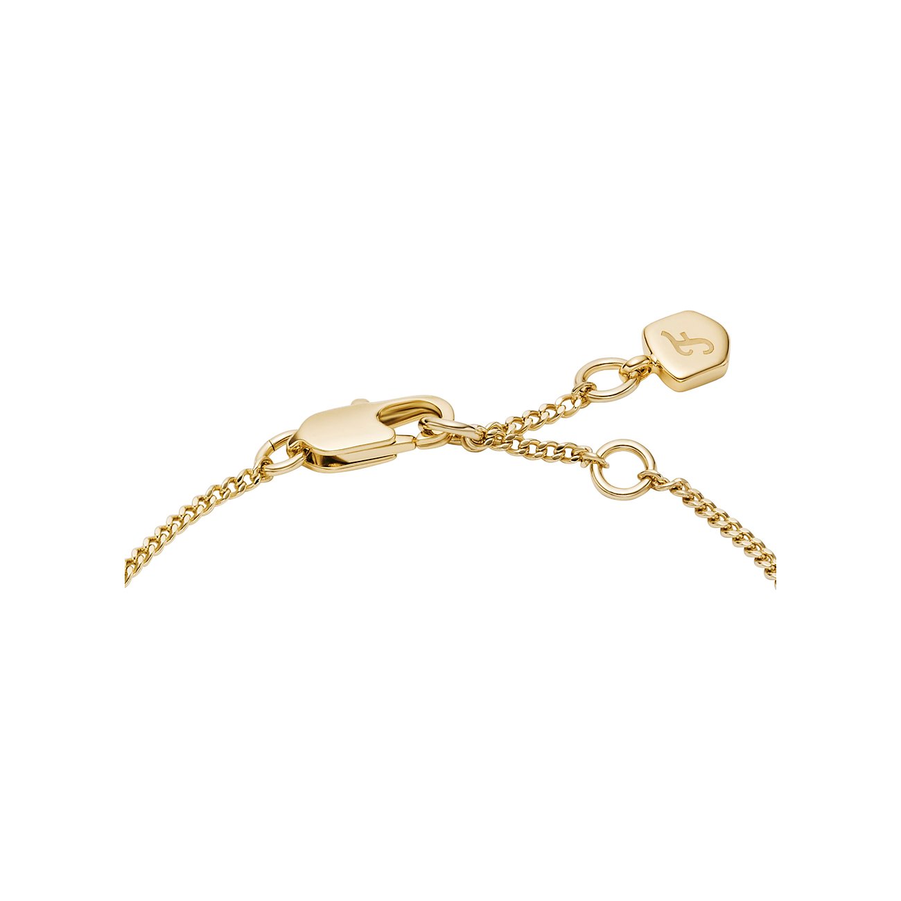 Närbild av Fossil-armbandets guldfärgade metallås och förlängningskedja med litet logoberlock.