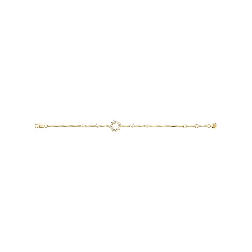 Fossil armbandsur i metall med guldfärgat band och ett runt hänge, dekorerat med klara glasstenar.