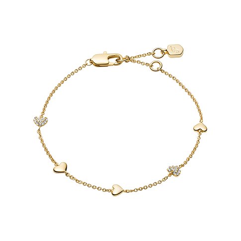 Fossil armband i guldfärgad metall med hjärtberlocker, vissa prydda med glittrande glasstenar.