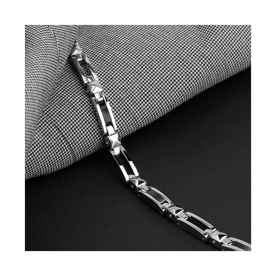 Morellato Armschmuck aus Edelstahl mit abwechselnd silbernen und schwarzen Gliedern, auf schwarzem Hintergrund.