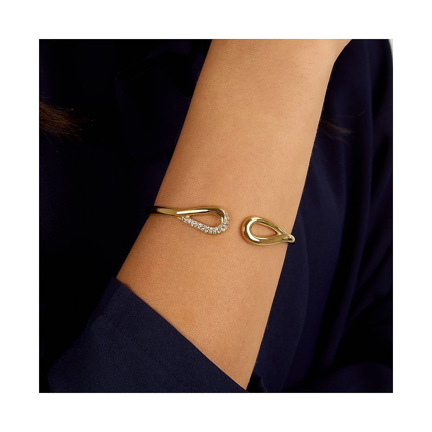 Morellato Armschmuck aus gelbgoldfarbenem Edelstahl. Die Spange endet in einer Schleifenform mit Kristall.