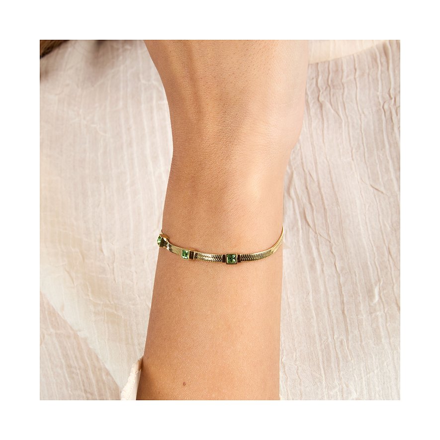 Bracciale Morellato dorato in acciaio inossidabile, indossato al polso, con cristalli verdi integrati nella catena.