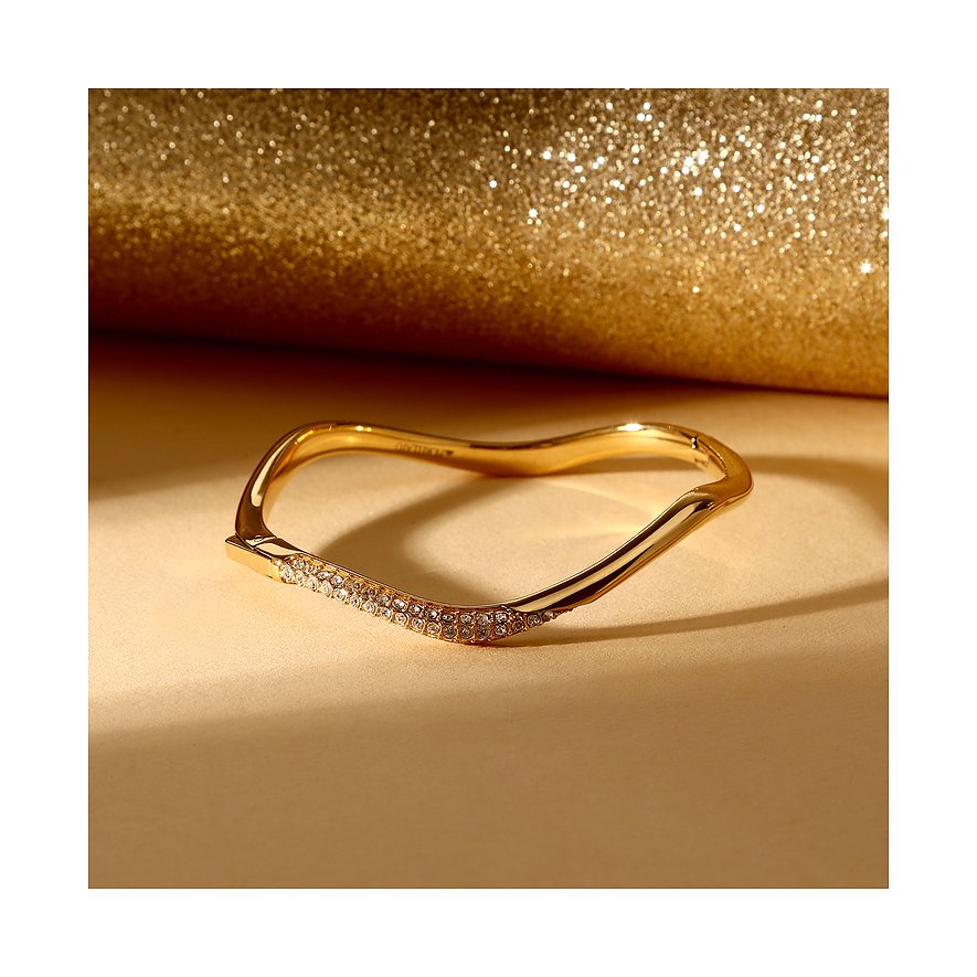 Morellato Armschmuck aus vergoldetem Edelstahl mit einer Welle aus glänzenden Kristallen im Vordergrund.