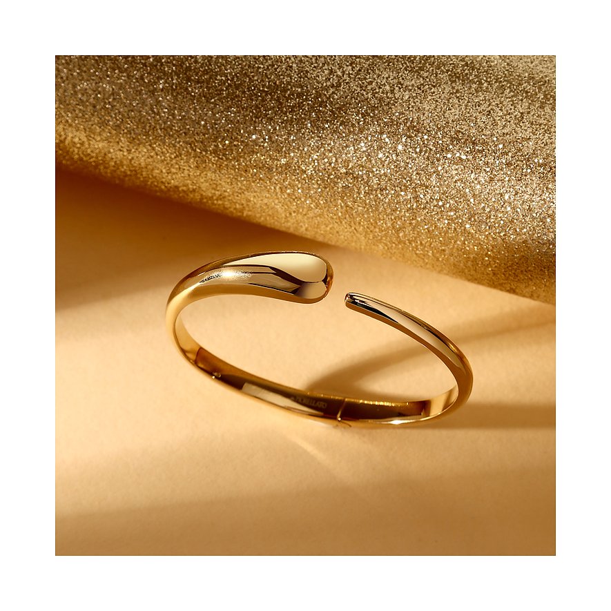 Ein glänzender goldfarbener Morellato Edelstahl-Armreif mit offener Vorderseite, schwebend über glitzerndem Hintergrund.