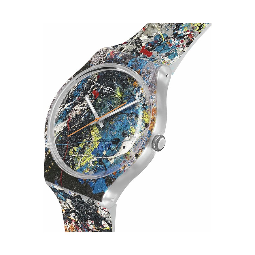 Swatch unisexur i plast med kunstnerisk farvesprøjt-design på urskive og rem, fotograferet skråt fra oven.