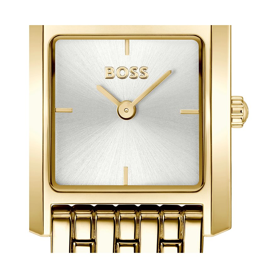 Nahaufnahme der Boss Damenuhr aus goldfarbenem Edelstahl mit Boss-Logo auf silbernem Zifferblatt.