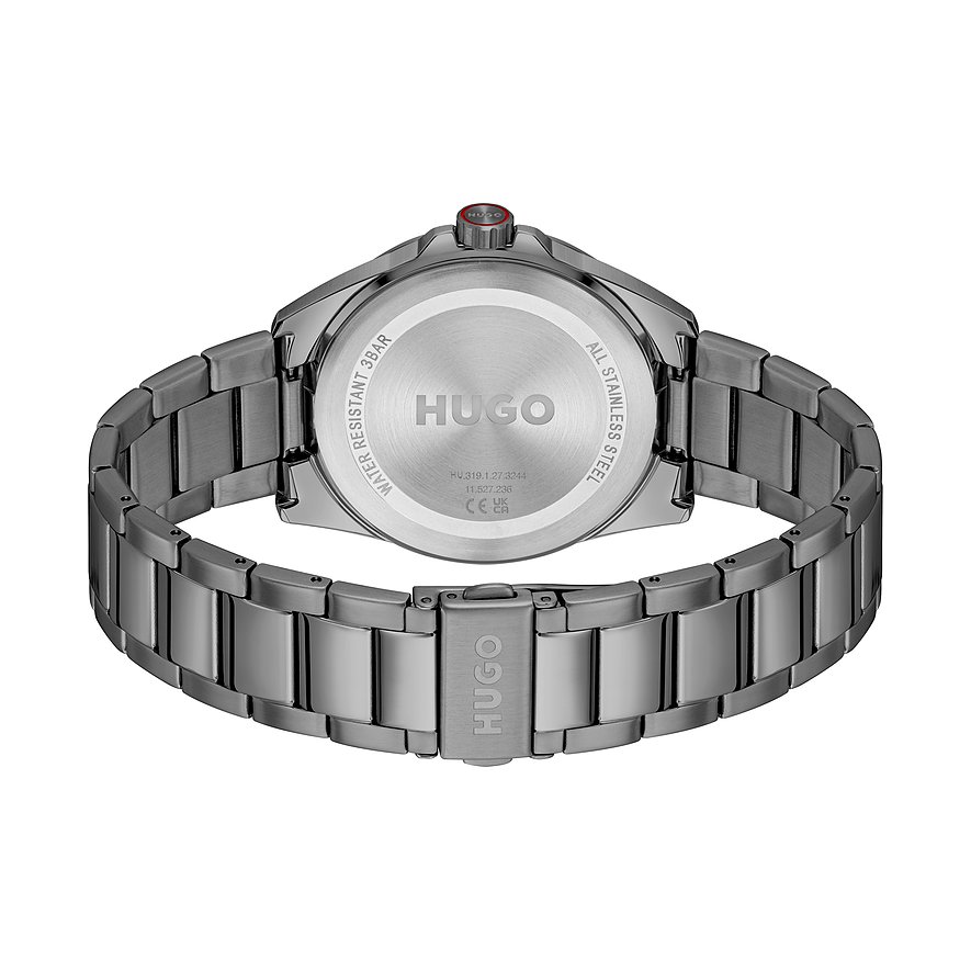 Achterkant van een Hugo herenhorloge in donkergrijs roestvrij staal, met gegraveerd Hugo-logo en technische details.