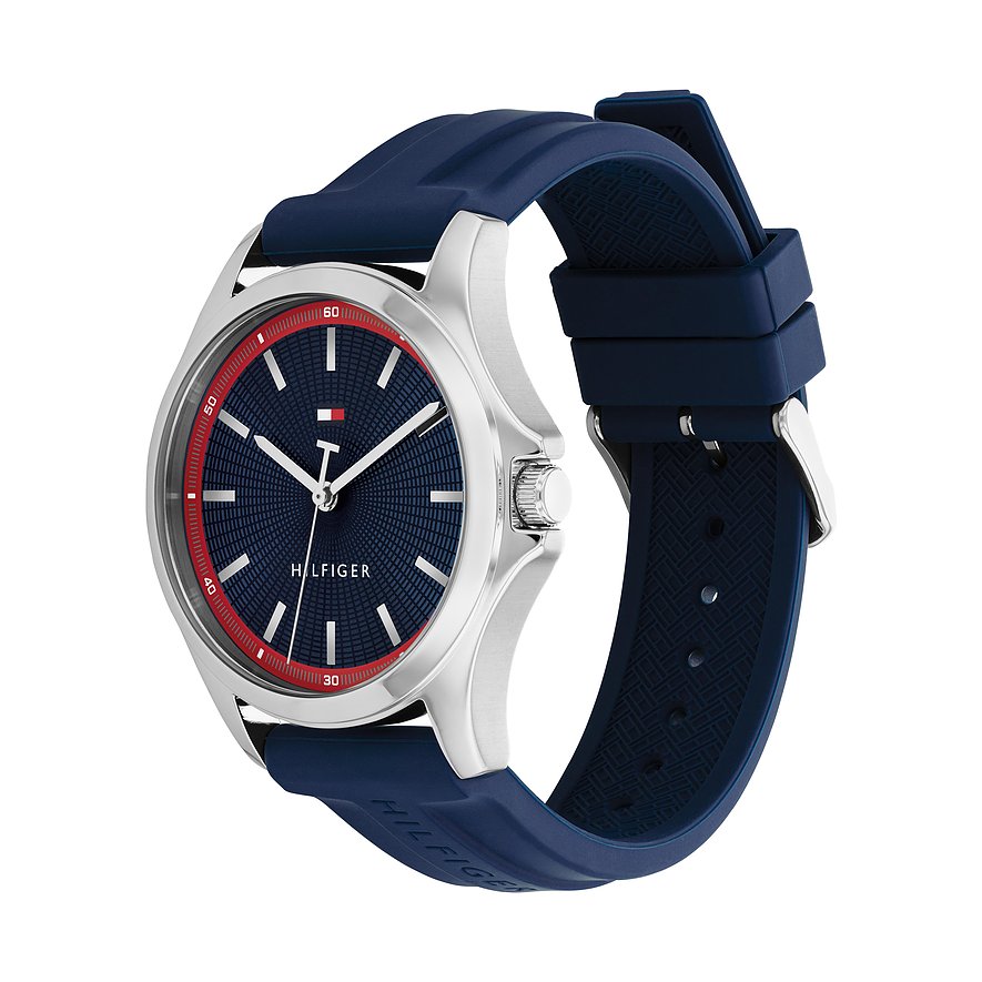 Tommy Hilfiger herenhorloge van blauw siliconen en roestvrij staal. Met een blauwe wijzerplaat en rode accenten.