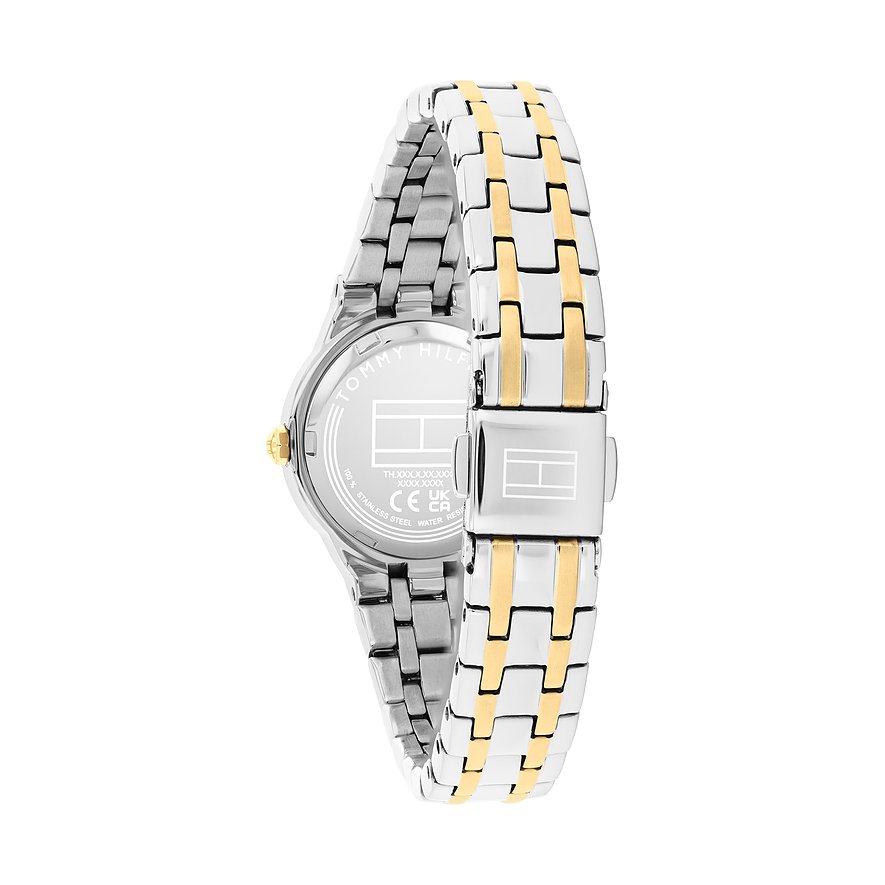 Rückseite einer Tommy Hilfiger Damenuhr aus poliertem Edelstahl mit goldfarbenen Akzenten im Armband.