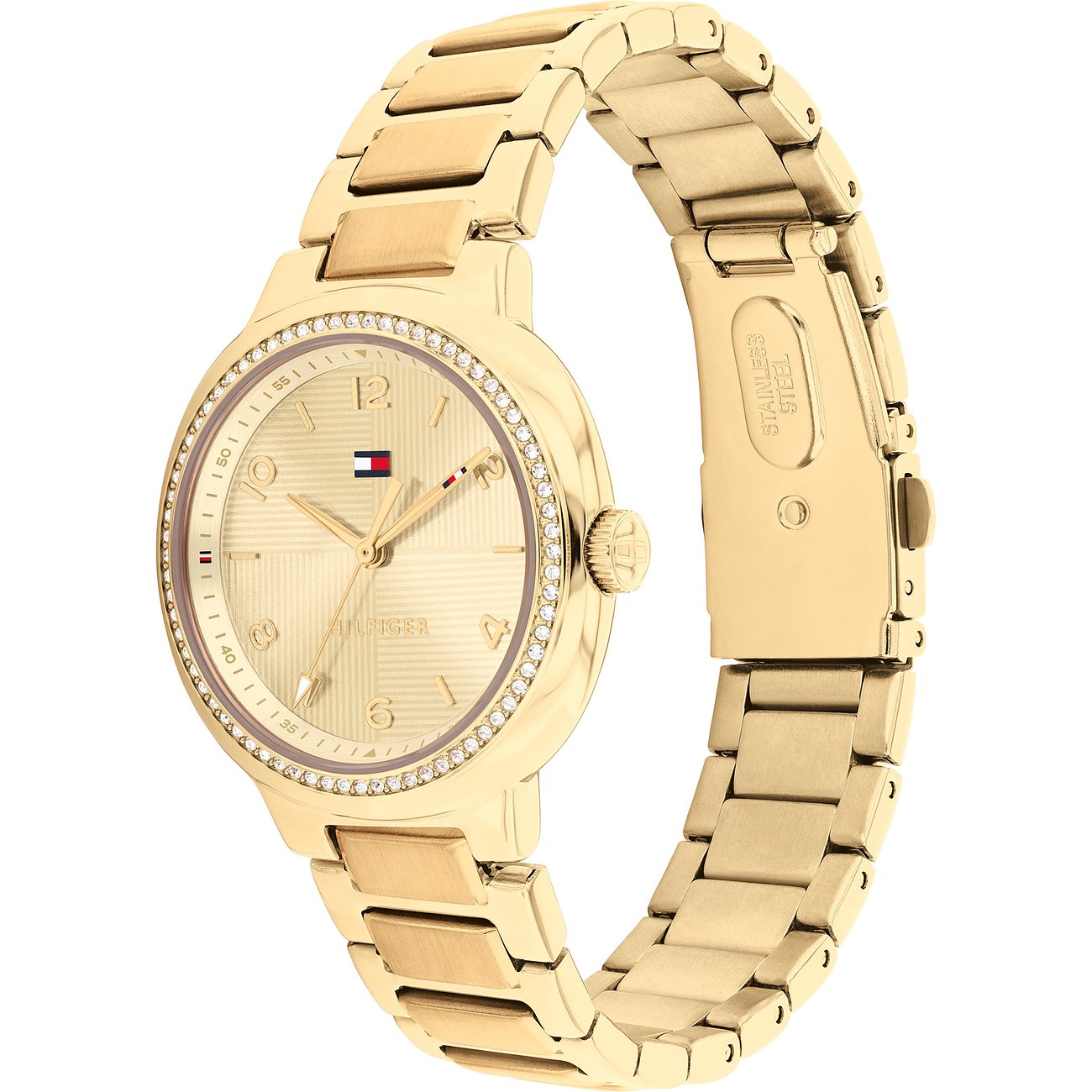 Nahaufnahme einer goldenen Tommy Hilfiger Damenuhr aus Edelstahl mit glänzendem Zifferblatt und steinbesetzter Lünette.