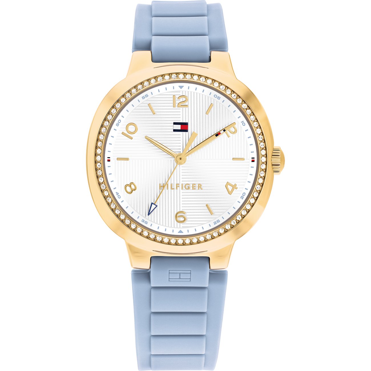 Die Tommy Hilfiger Damenuhr aus edlem goldfarbenen Edelstahl besitzt ein hellblaues Silikonarmband mit Farbsteinen.