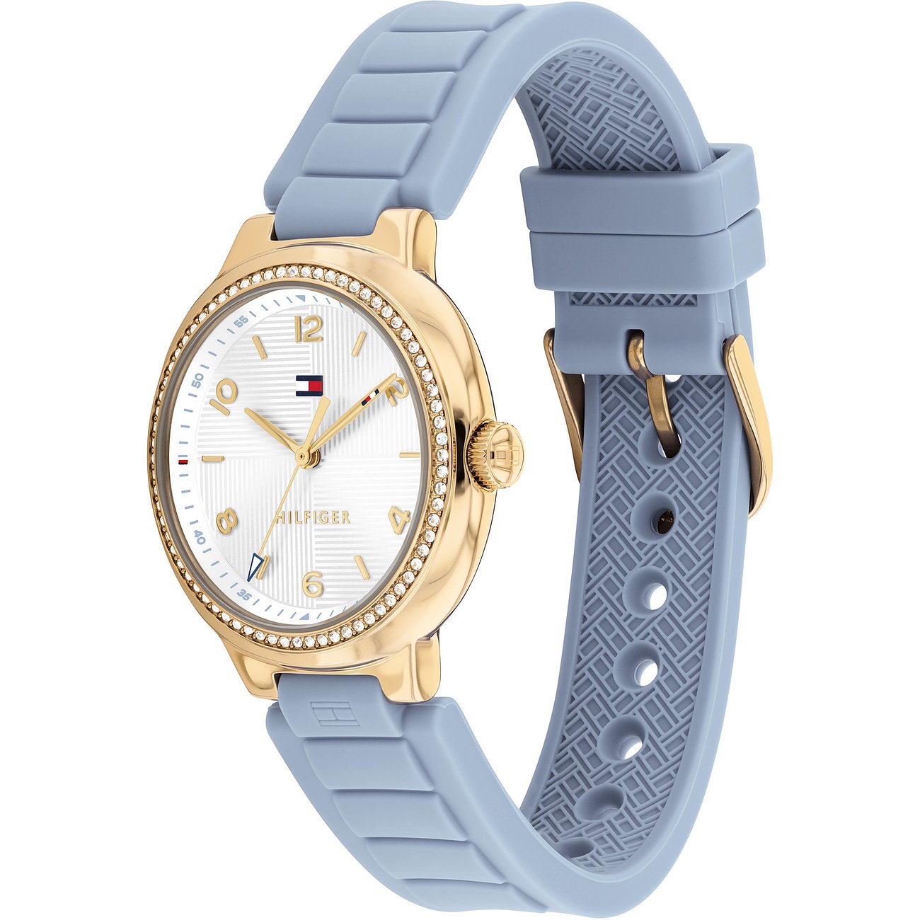 Tommy Hilfiger Damenuhr aus goldfarbenem Edelstahl mit hellblauem Silikonarmband und Besatz aus klaren Schmucksteinen.