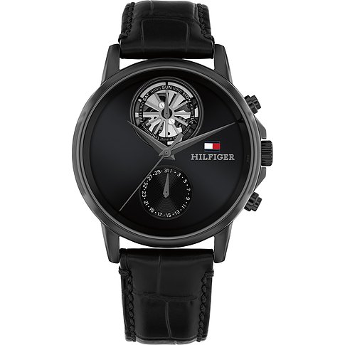 Eine schwarze Tommy Hilfiger Herrenuhr aus Edelstahl mit krokodillederähnlichem Armband und komplexem Zifferblatt.