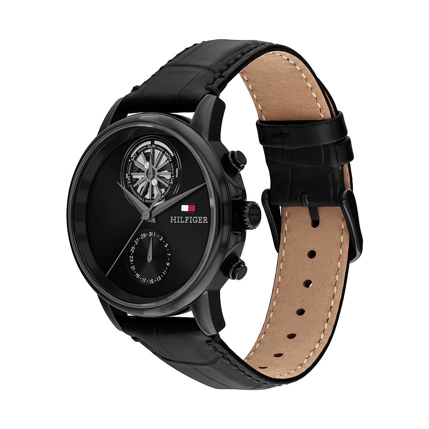 Tommy Hilfiger Herrenuhr aus blauem Edelstahl mit Zifferblatt, schwarzem Lederband und Ziernähten.
