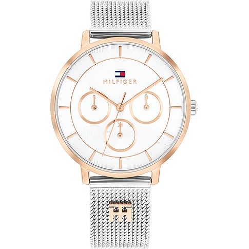 Die Tommy Hilfiger Damenuhr aus Edelstahl von vorne gesehen, mit rosegoldfarbenem Gehäuse und silbernem Mesh-Armband.
