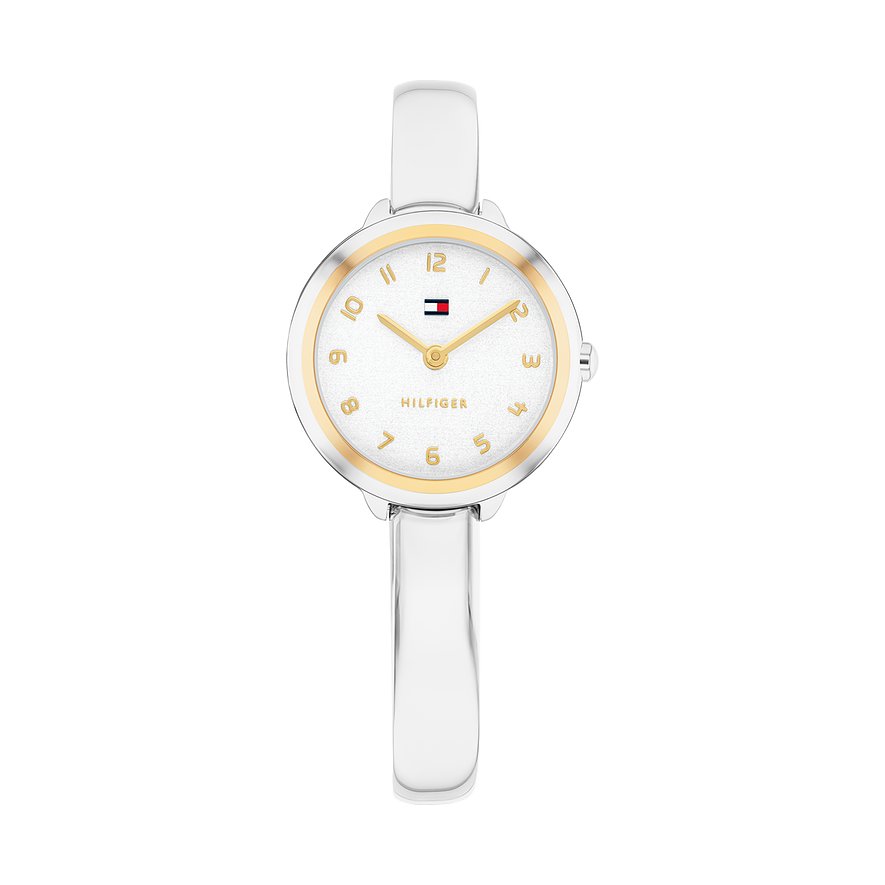 Eine Tommy Hilfiger Damenuhr aus Edelstahl mit einem silbernen Armband und einem goldfarbenen Gehäuse.
