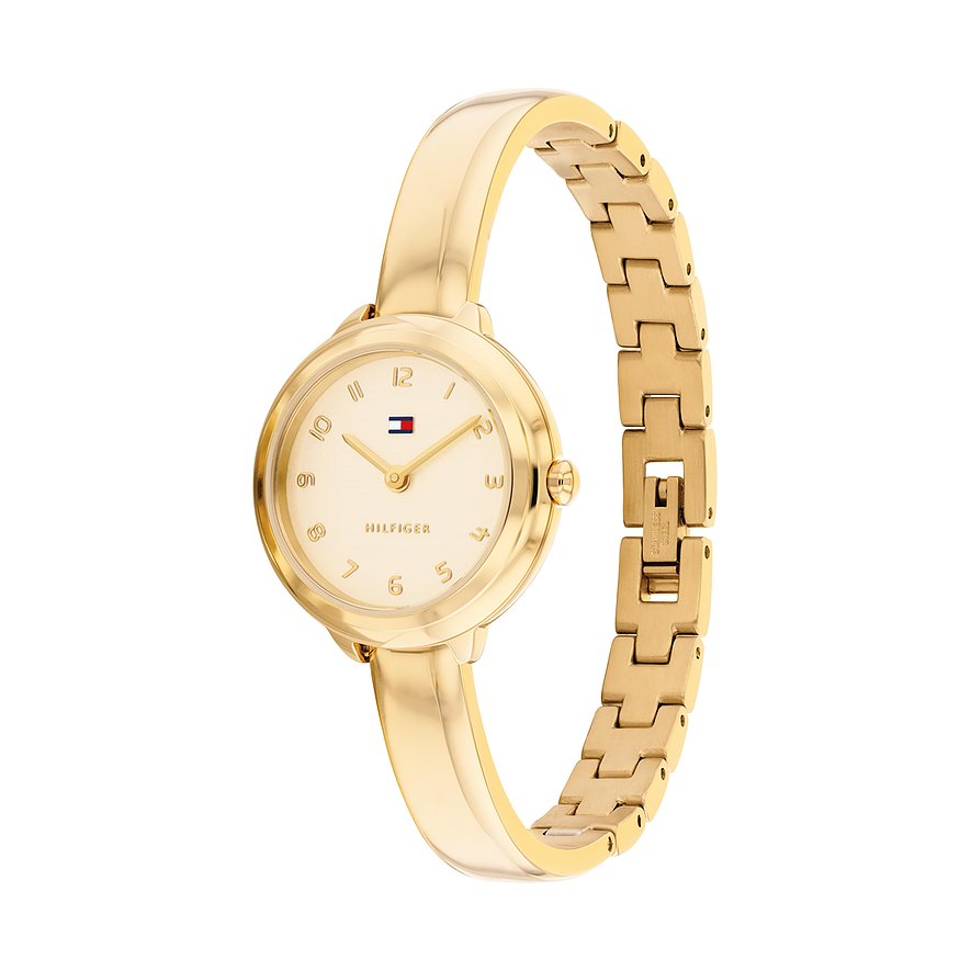 Tommy Hilfiger Damenuhr aus goldfarbenem Edelstahl. Die Uhr hat ein leicht cremefarbenes Zifferblatt mit goldenen Ziffern.