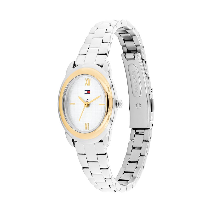 Tommy Hilfiger Damenuhr aus Edelstahl mit ovaler, goldfarbener Lünette und silbernem Gliederarmband.