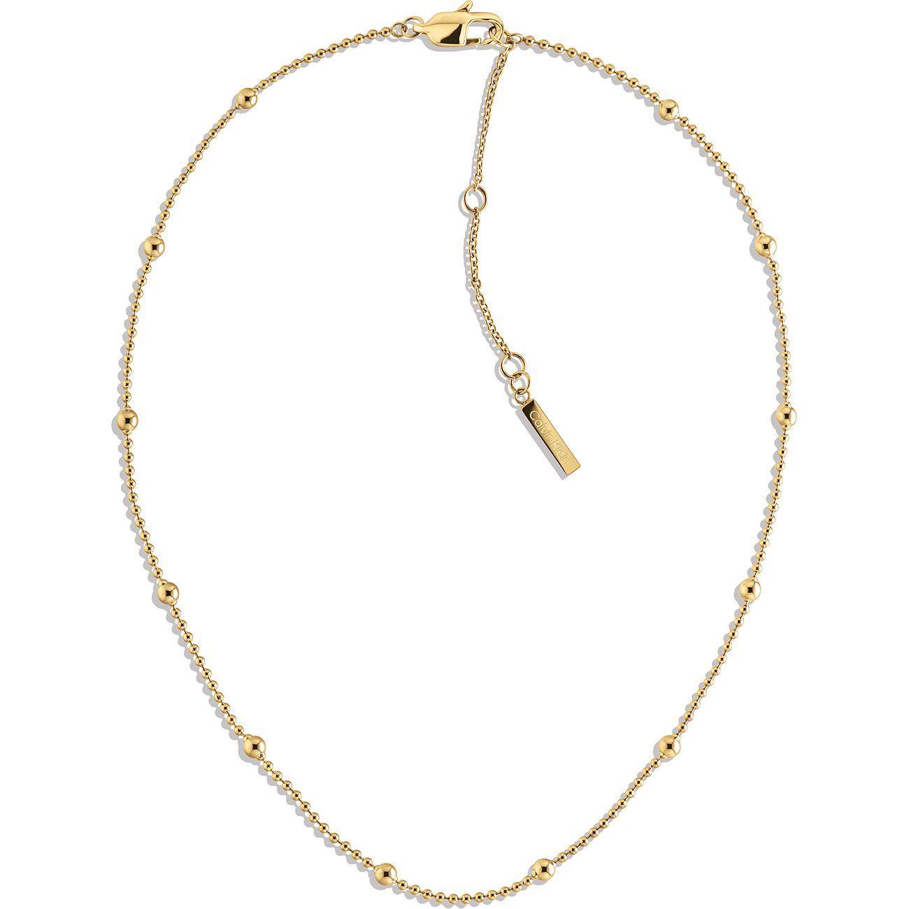 Calvin Klein ketting van goudkleurig roestvrij staal met kleine ronde kralen langs de ketting, op een model.